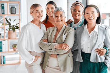 Diversity, portrait and business women with support, teamwork and group empowerment in office leadership. Career love and hug of asian, black woman and senior people or employees smile for solidarity.