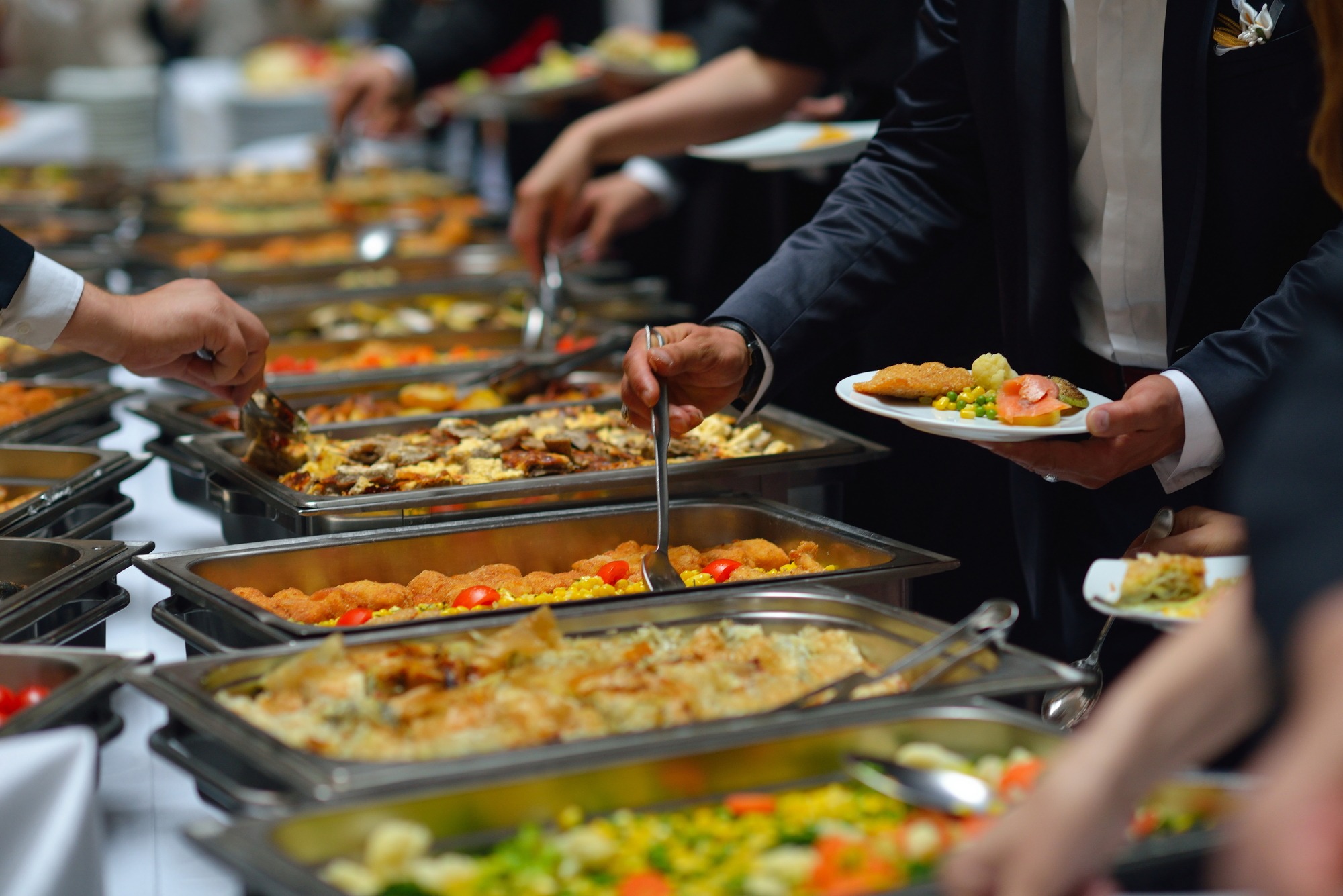 people group catering buffet food indoor in luxury restaurant with meat colorful fruits and vegetables.